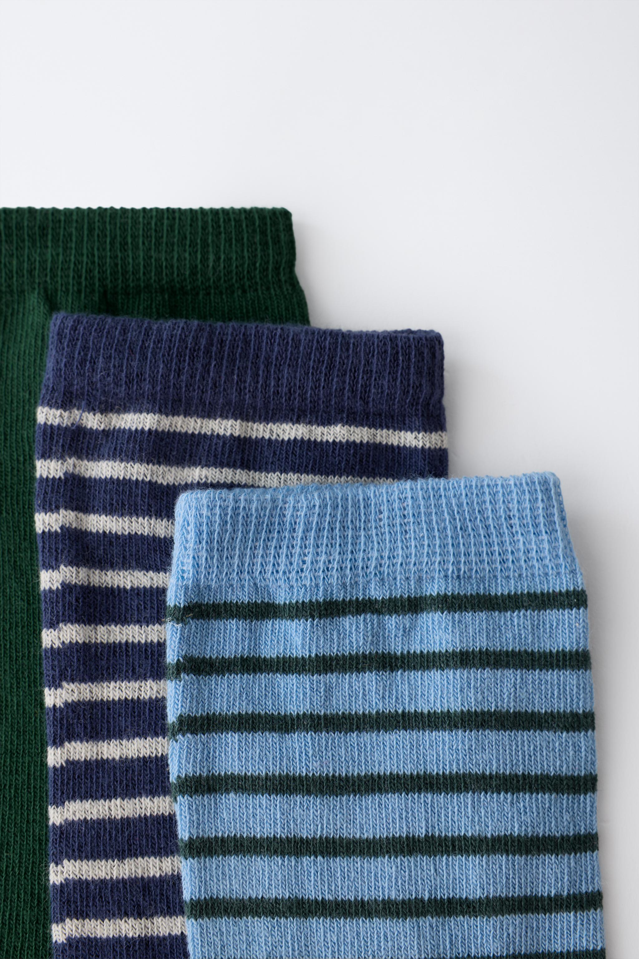 STRIPED AND SOLID MID-CALF SOCKS THREE-PACK